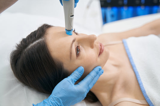 Woman having an Hydrafacial treatment.